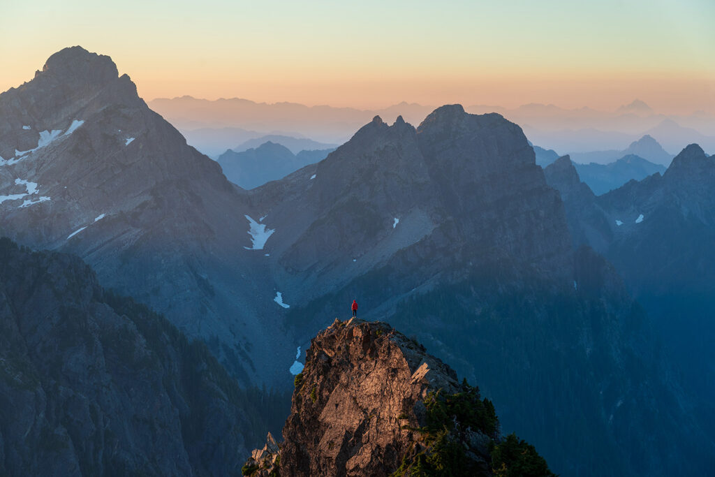 standing on mountain vesper peak north cascades